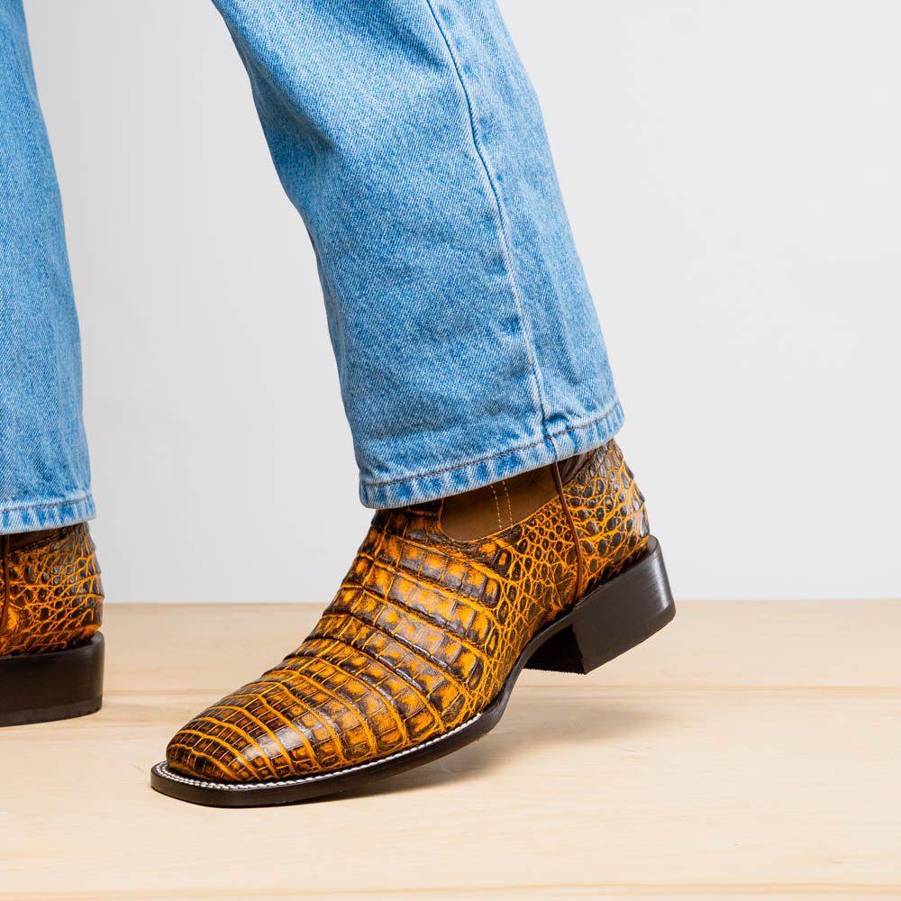 Tucson Mustard Brown genuine caiman belly skin cowboy boots with square-toe design for men, showcasing Western sophistication.