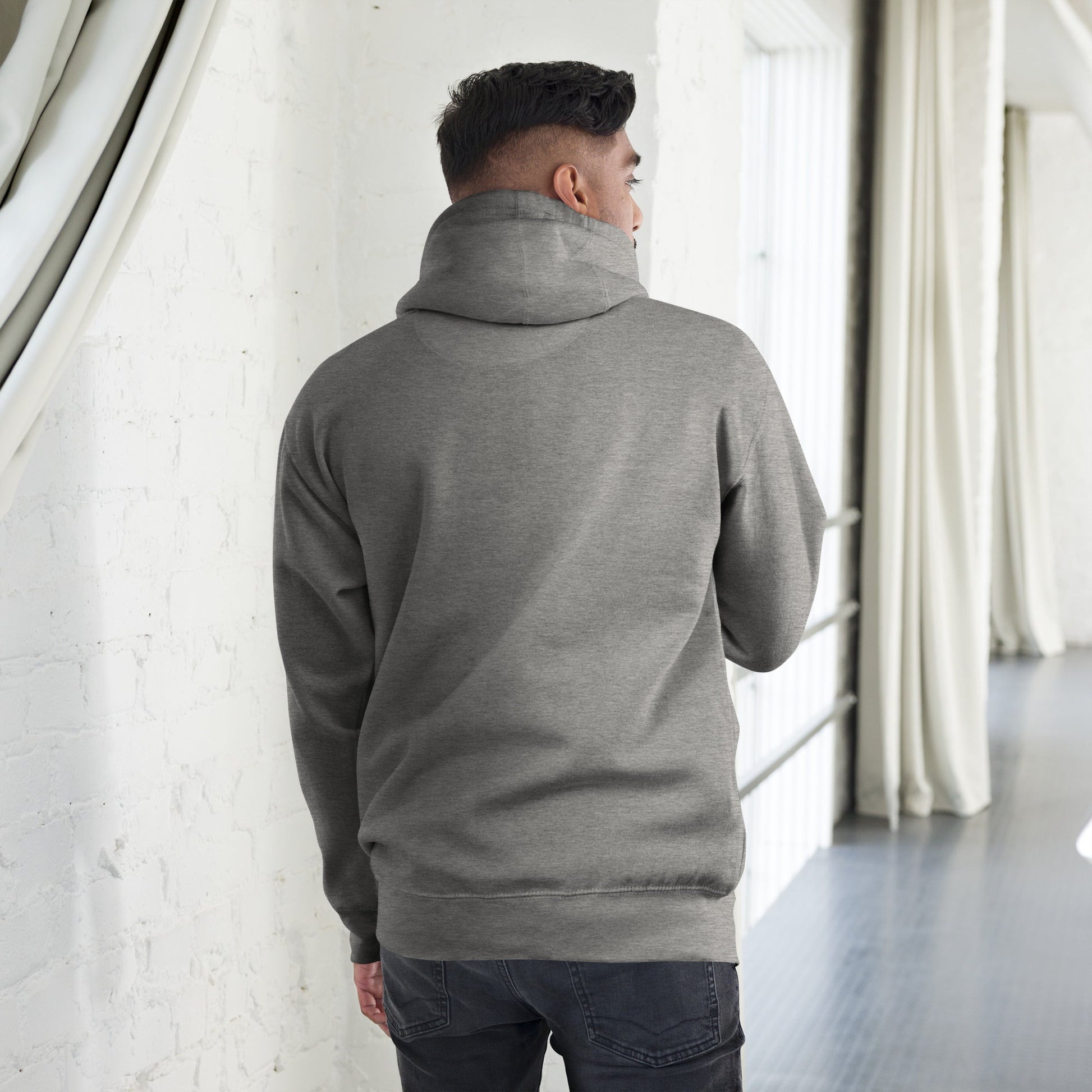 Rear view of a person wearing Men’s Green Smile Hoodie – Trendy & Comfortable Streetwear with a Fun Twist in an indoor setting.
