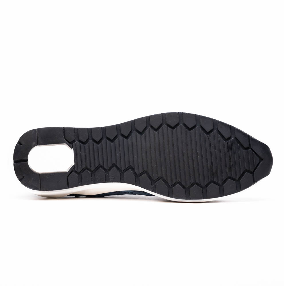 Sole view of Varenna Blue Jeans luxury sneaker with textured tread design.